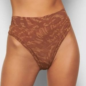 SKIMS summer mesh thong in Latte swirl